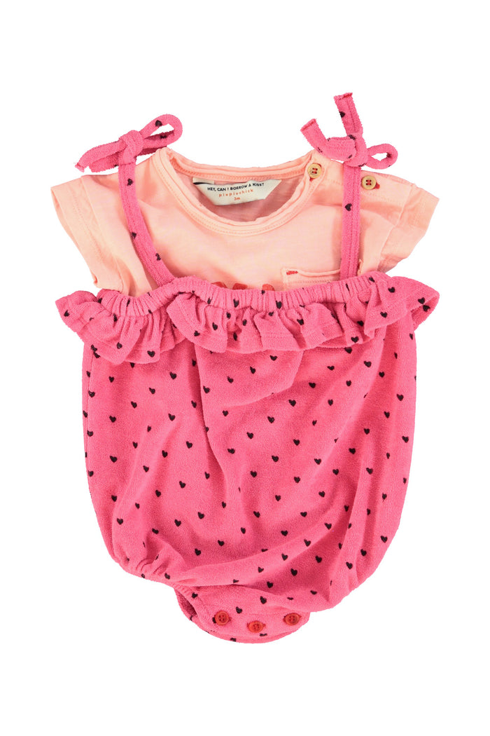 baby romper w/ ruffles | pink w/ black hearts allover