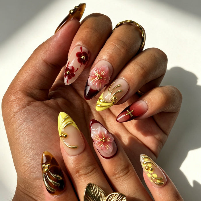 Gold swirl wine‑red ombre almond press‑on nails fall manicure view