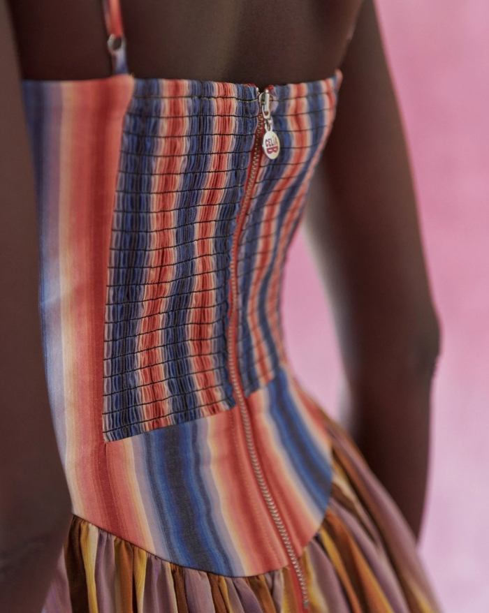 Close-up of a colorful striped skirt with a blurred background