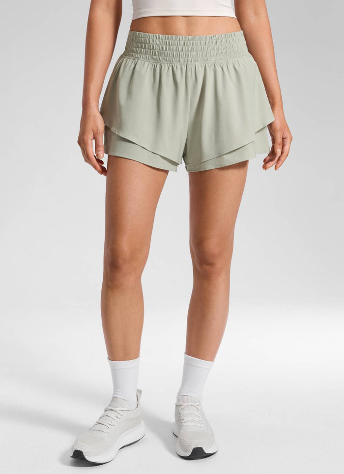 CRZ YOGA Women's Feathery-Fit Drapey Tennis High Rise Flowy Short 2.5" Fog Green