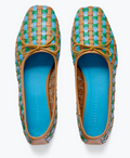 Woven shoes with a blue sole on a white background