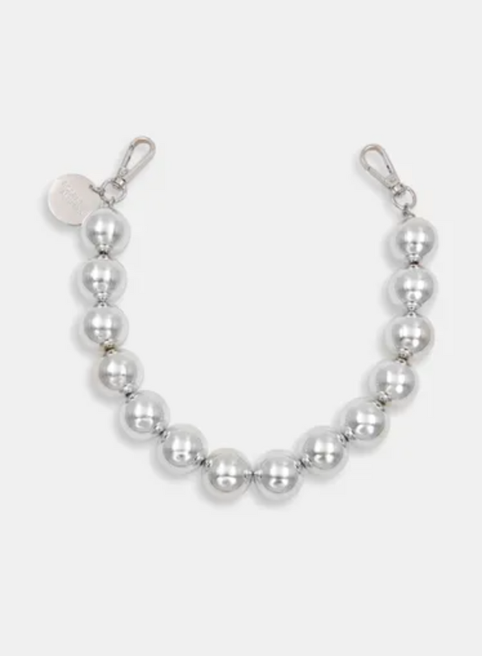 Silver beaded necklace on a white background