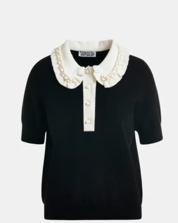 Black top with a white collar featuring pearls on a light gray background