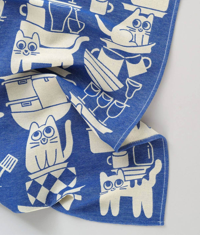 Kitchen Cats Cotton Tea Towel featuring playful cat designs, made from 100% woven cotton in blue and cream.