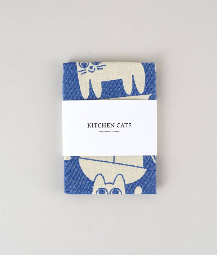 Kitchen Cats cotton tea towel design featuring playful cats made in 100% woven cotton in packaging.