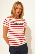 Woman wearing a red and white striped t-shirt with 'J'adore' text on a plain background