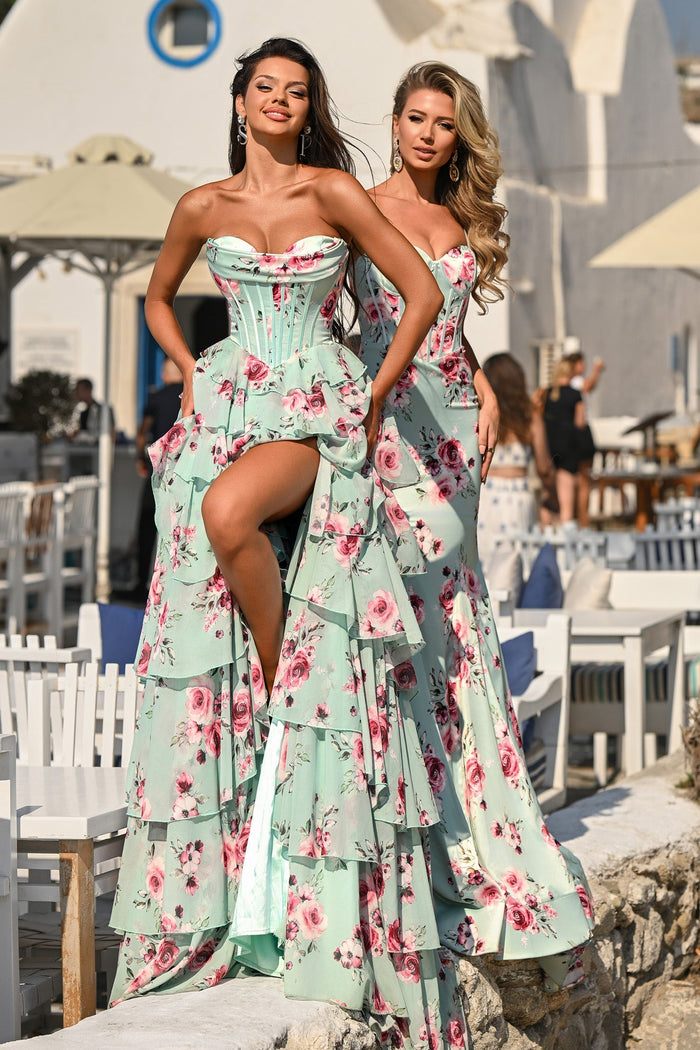 Two women in mint floral gowns