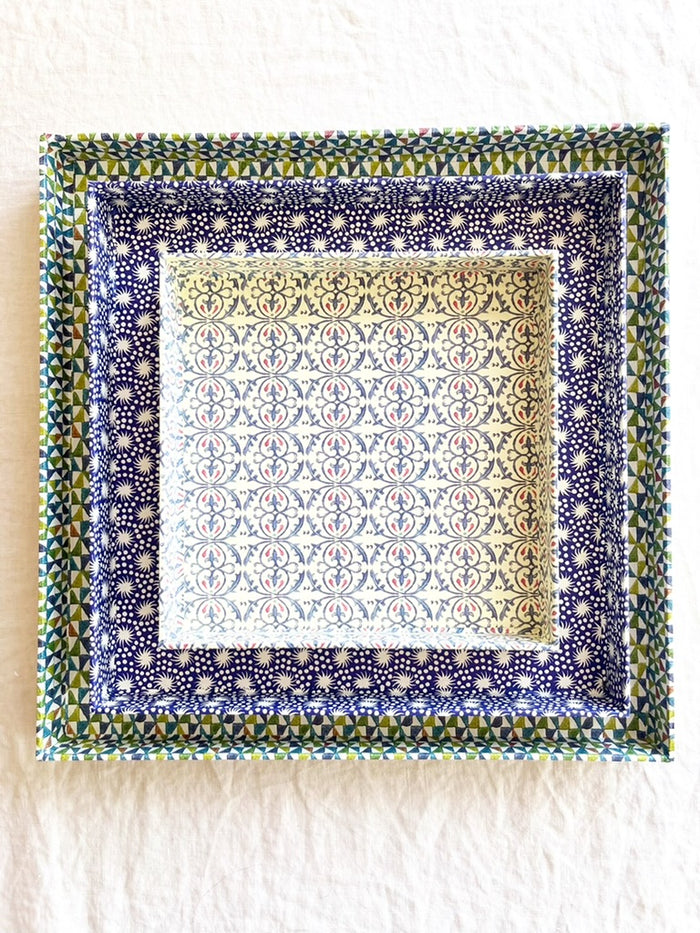 square paper tray with blue green pink and white triangle print 13 inches nested with smaller trays