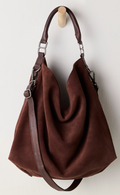 Brown handbag with a strap on a white background