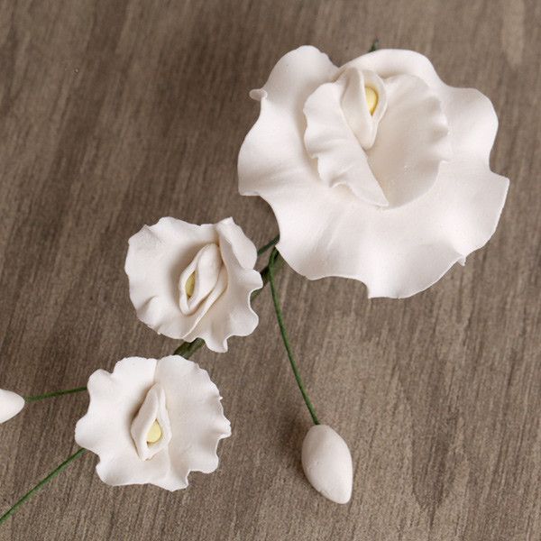 White Gumpaste Sweet Pea Filler sugarflower cake decorations perfect for cake decorating fondant cakes and cupcakes.  Wholesale sugarflowers. Caljava